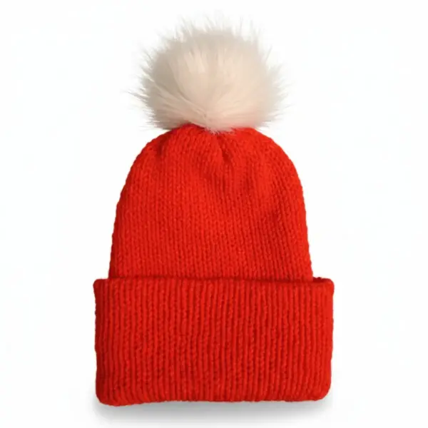 Red knit hat with a white fur pompom on a plain white background
